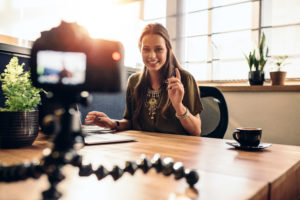 this is an image of a camera sitting on a tripod making a video