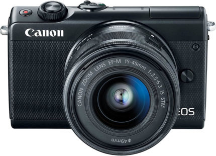 This is an image of a black Canon EOS M100 digital camera with 24.2 Megapixel cmos sensor, 15-45mm lens and 3.0-inch tilt-type LCD.