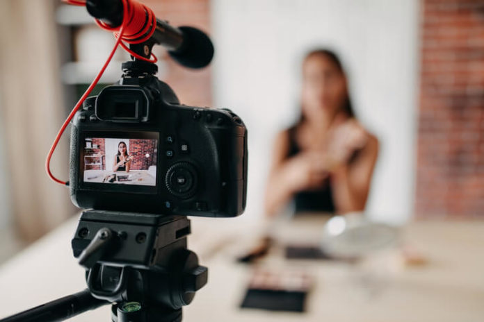 digital camera recording a woman