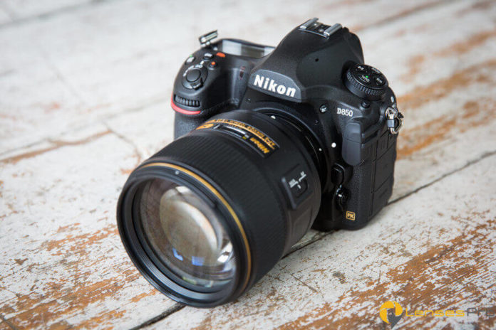 Nikon D850 digital camera with a large lens attached to mainbody