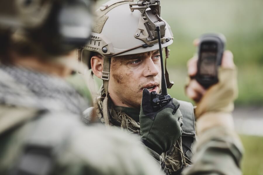 Two soldiers exchanging communication